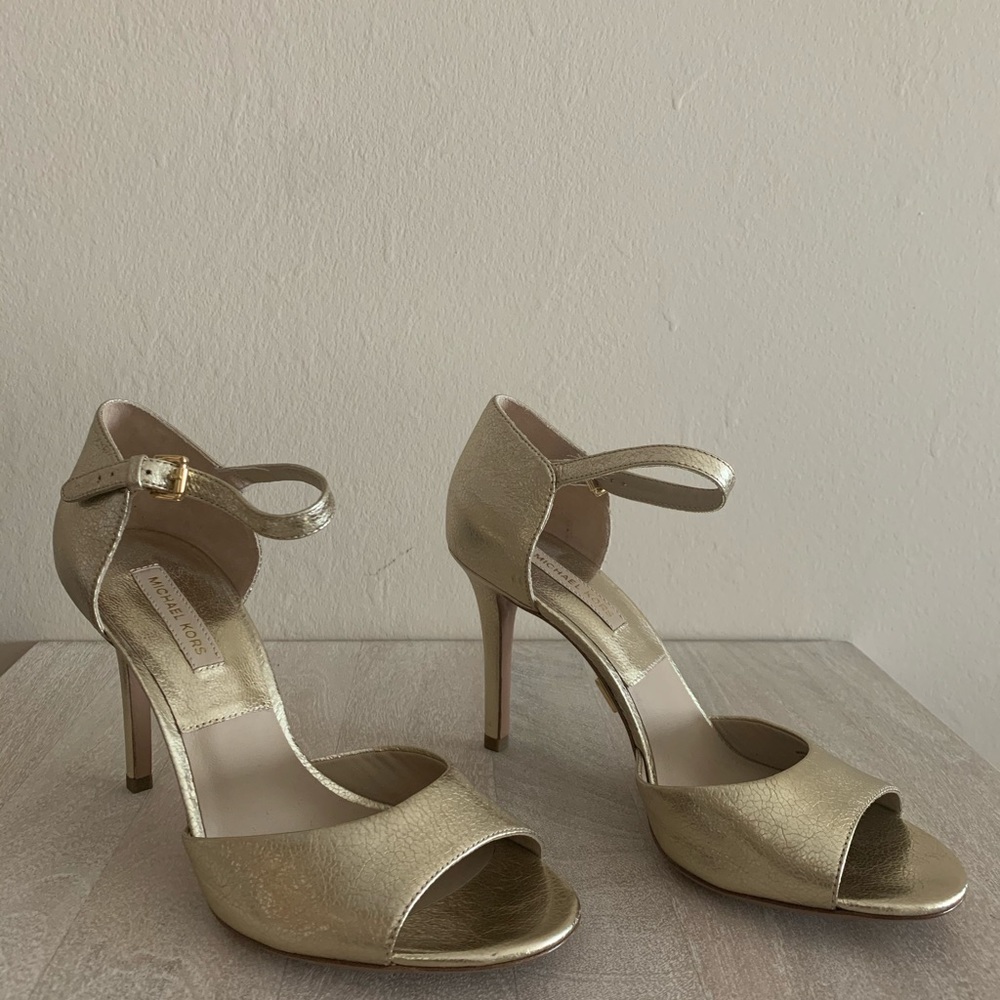 Michael Kors gold heels.